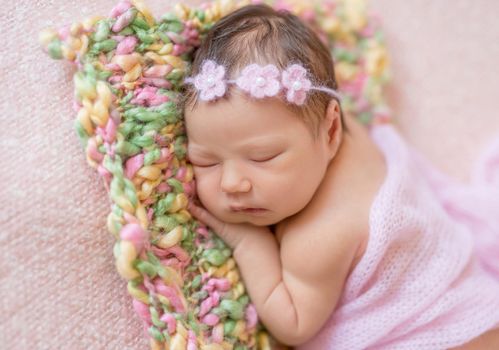 Cute sleeping newborn baby girl