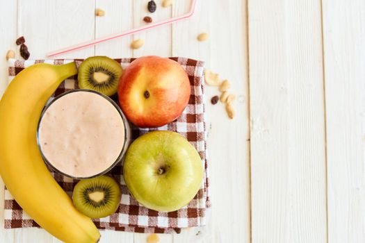 fresh fruit cocktail breakfast dessert organic wood background. High quality photo