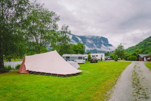 Traditional red camping houses in Lunde Camping, Norway July 21, 2019. Classical Norwegian Camping site with traditional wooden red cottages, Northern Norway. Camping cabins.