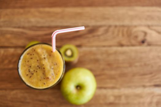 smoothie fresh fruit cocktail dessert healthy food in wooden background. High quality photo