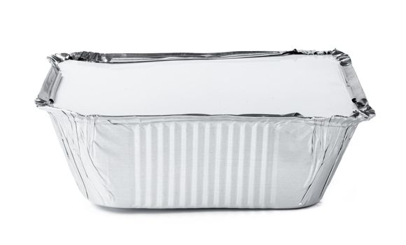 Packed foil food boxes on white background, copy space, close up