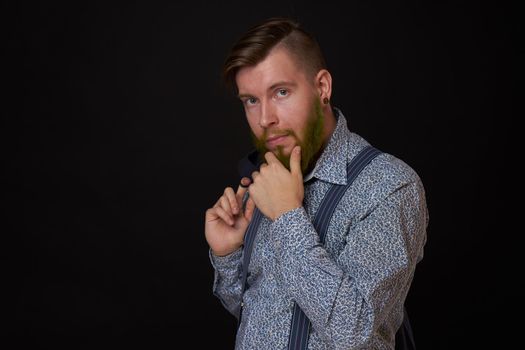 business man in shirt with jacket over his shoulders posing self confidence. High quality photo