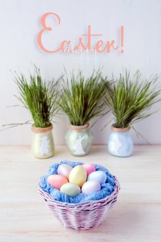 Cute creative photo with easter eggs in the nest