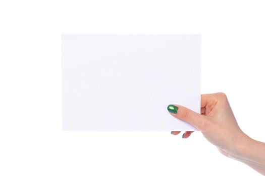 Woman's hand showing white paper banner isolated on white background