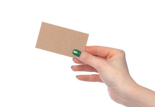 Craft paper card in female hand isolated on white background