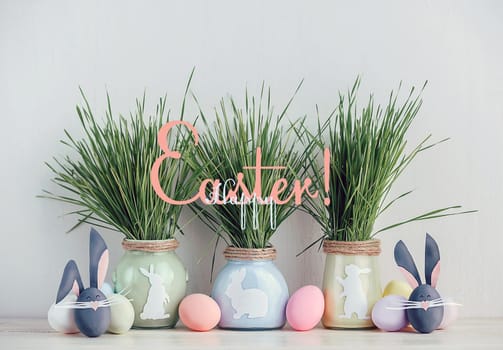 Cute creative photo with easter eggs, some eggs as the Easter Bunny