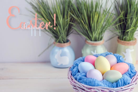 Cute creative photo with easter eggs in the nest