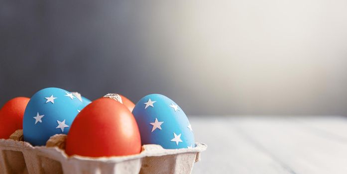 american easter concept. Easter eggs painted in the style of the American flag.