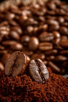 coffee beans lying on a mound of coffee