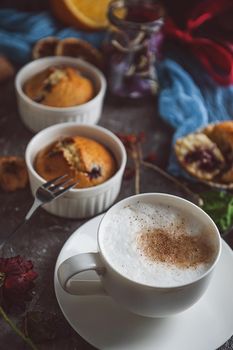 spring breakfast with muffins in rustic style