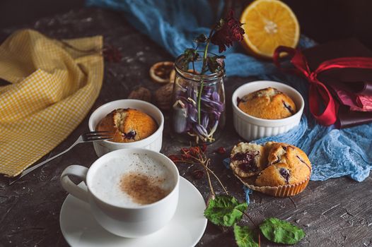 spring breakfast with muffins in rustic style