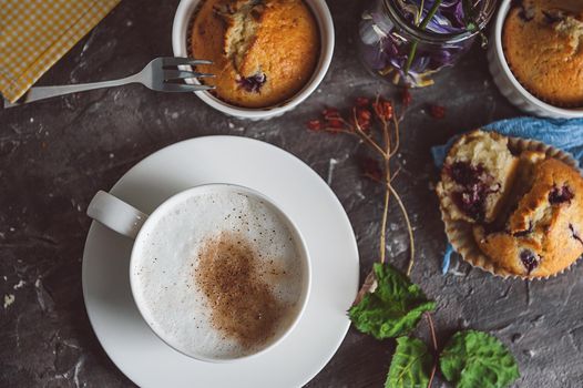 spring breakfast with muffins in rustic style