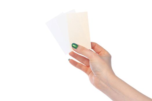 Woman's hand showing white paper banner isolated on white background