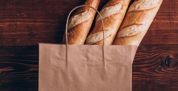 fresh bread in a paper bag. small bakery concept with gluten free flavored bread