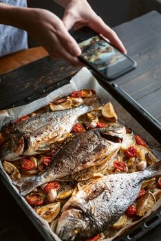 food photographer shoots a finished dish