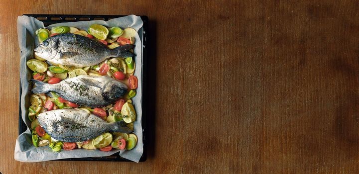 fish is prepared for baking in the oven