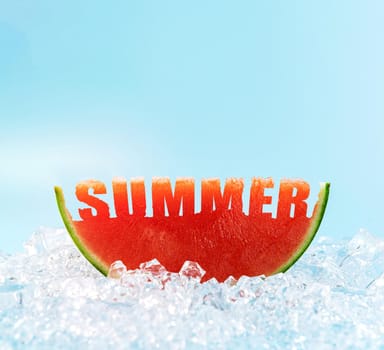 a slice of watermelon on the ice, in which the word summer is carved.