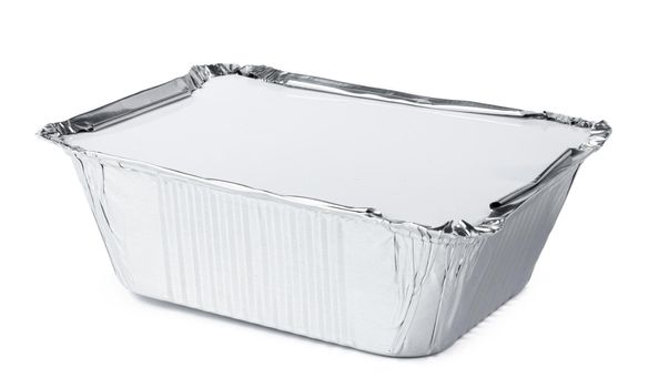 Packed foil food boxes on white background, copy space, close up