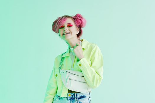 cheerful woman with bright makeup pink hair Glamor posing fun. High quality photo