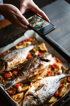 food photographer shoots a finished dish
