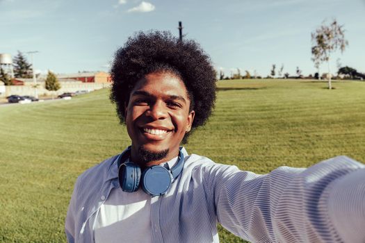 selfie of young african american man in outdoors