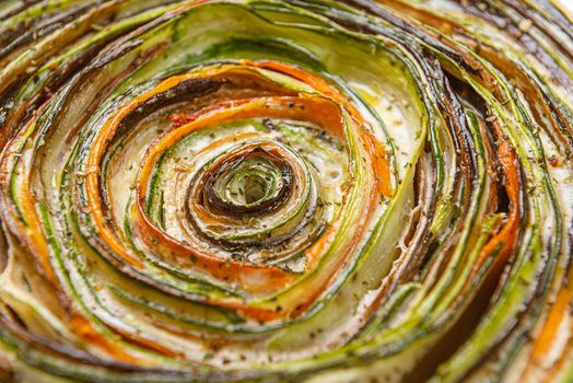 classic ratatouille pie on a light gray table.