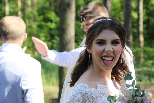 Wedding photography in rustic style emotions of the bride on the nature on the rocks