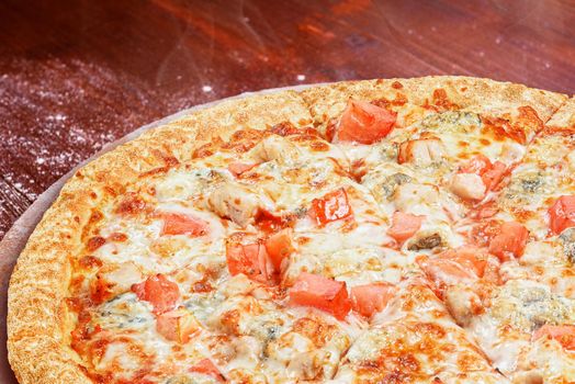 classic Italian pizza on a wooden tray, served in a small authentic Italian restaurant