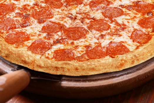 classic Italian pizza on a wooden tray, served in a small authentic Italian restaurant