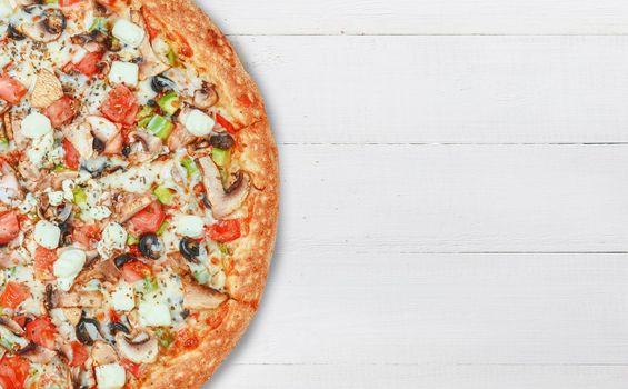 pizza close-up on a wooden surface