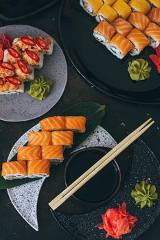 Sushi with salmon, cream cheese Philadelphia, cucumber and wasabi.