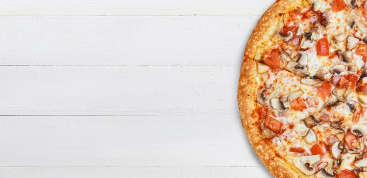 pizza close-up on a wooden surface