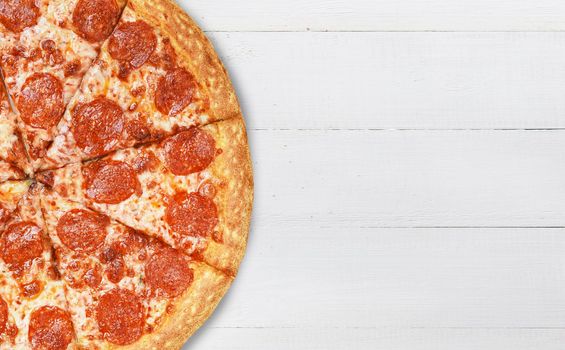 pizza close-up on a wooden surface