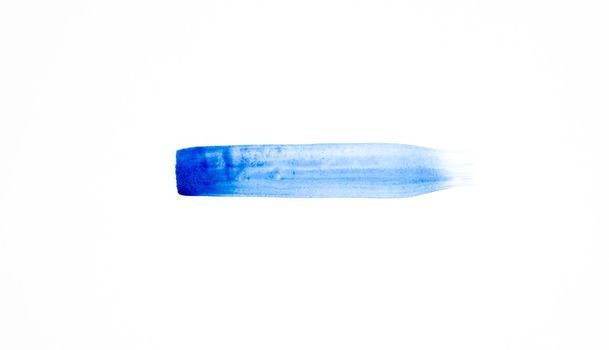 Trendy classic blue smear of acrylic paint isolated on white background.