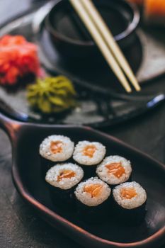 Sushi with salmon, cream cheese Philadelphia, cucumber and wasabi.