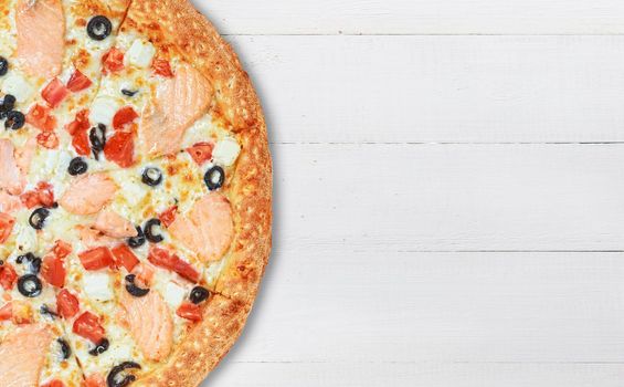 pizza close-up on a wooden surface