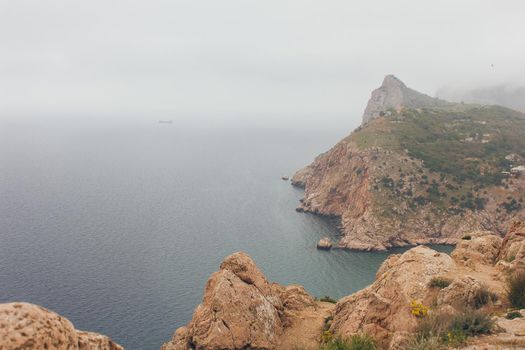 Beautiful view on a Black sea coast with mountains and blue sky.