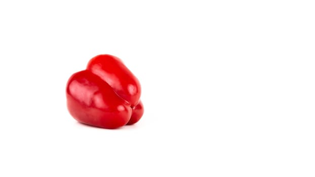 One red sweet bell pepper isolated on white background