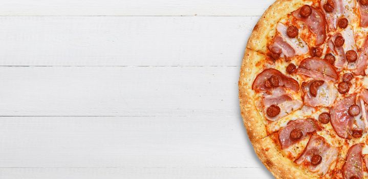 pizza close-up on a wooden surface