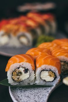 Sushi with salmon, cream cheese Philadelphia, cucumber and wasabi.