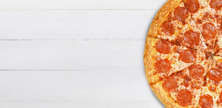 pizza close-up on a wooden surface