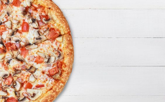 pizza close-up on a wooden surface