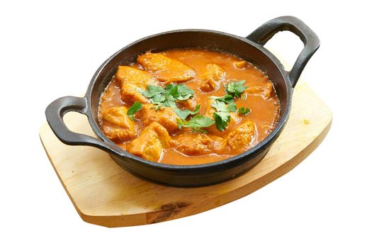 Overhead  shot of Chicken curry baked in little pan. Isolated on white with clipping path