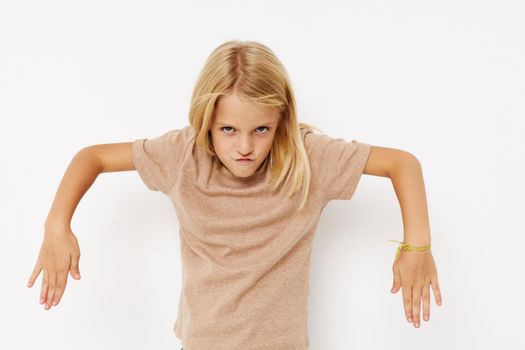 happy cute girl with blond hair posing studio. High quality photo