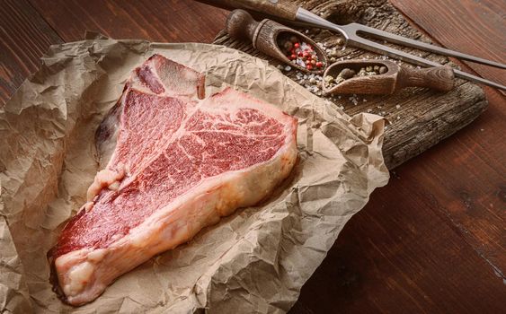 raw tbone steak for blessing day and christmas holidays. A piece of fresh organic farm meat