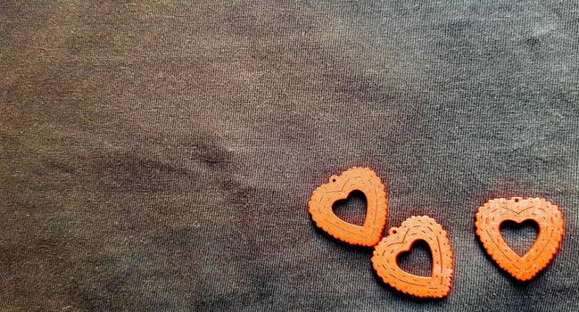 Valentine's day red hearts on a black background.
