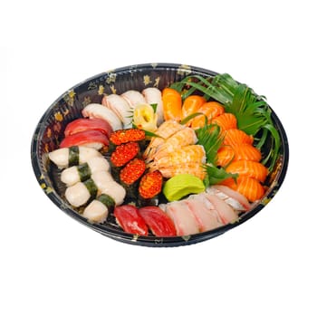 take away selection of fresh sushi express on plastic tray 