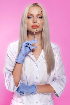 Portrait of attractive woman with arrows on her face skin for cosmetology