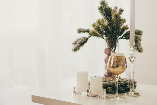 New Year's decorated house and the Christmas Tree in Scandinavian style light colors