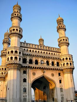 Close up image of Charminar with a clear blue sky background in Hyderabad.